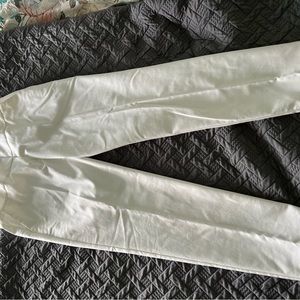 White slim fit pants with cuffs.